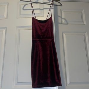 Maroon velvet dress. Detailed design in the back. Mini